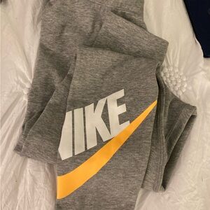 Nike Kids Gray Leggings with Yellow Swoosh